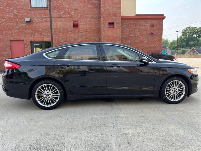 used 2016 Ford Fusion car, priced at $8,995