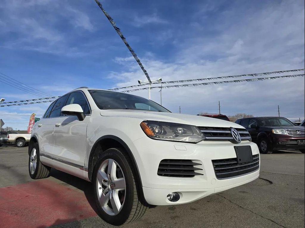 used 2012 Volkswagen Touareg car, priced at $3,977