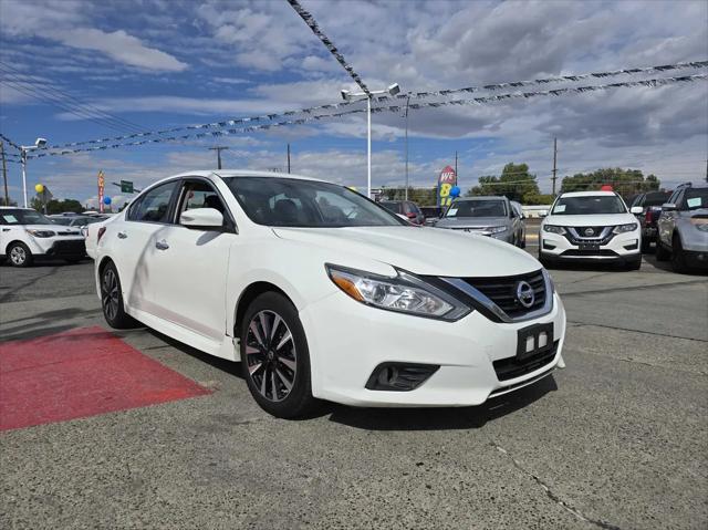 used 2018 Nissan Altima car, priced at $9,977