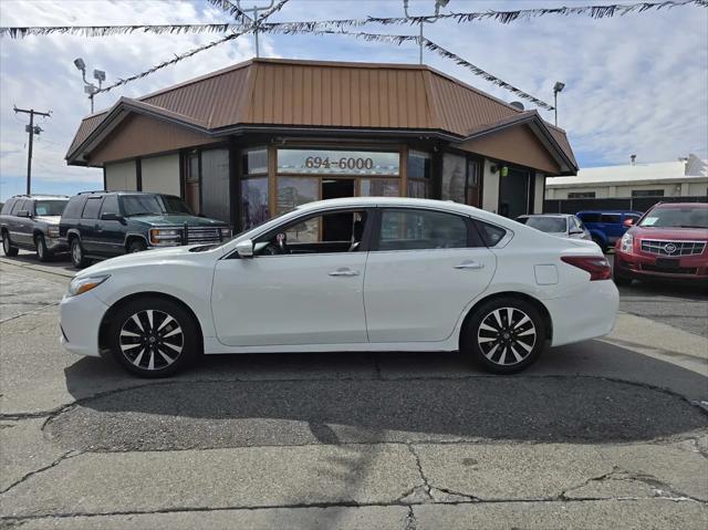 used 2018 Nissan Altima car, priced at $9,977