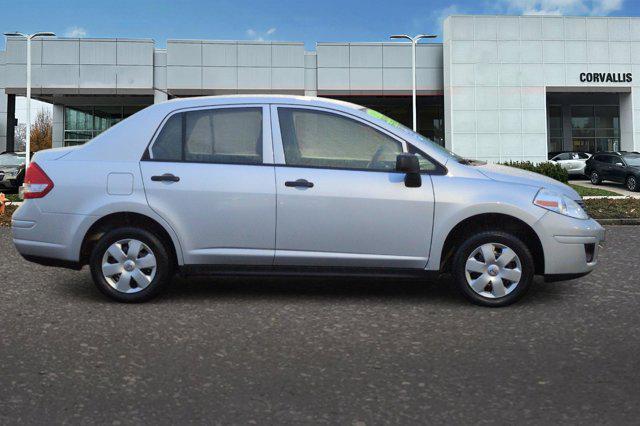 used 2010 Nissan Versa car, priced at $5,000