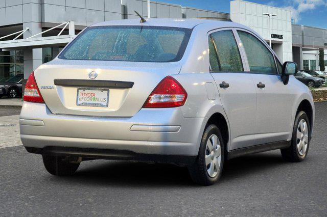 used 2010 Nissan Versa car, priced at $5,000