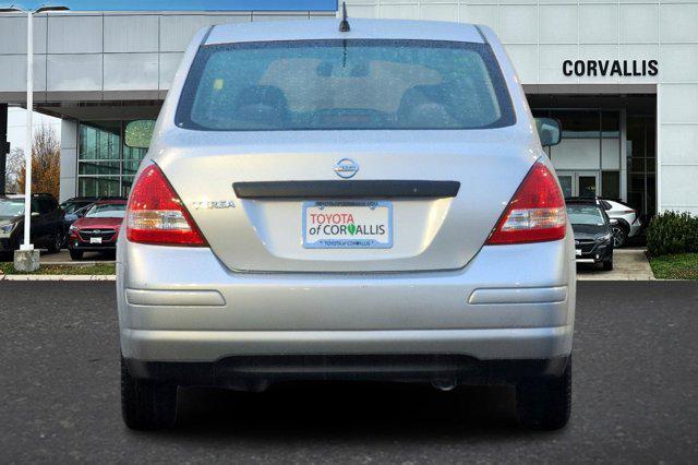 used 2010 Nissan Versa car, priced at $5,000