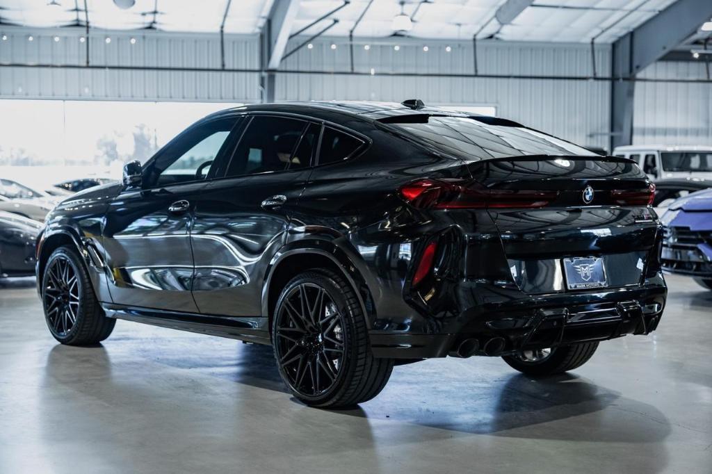 used 2025 BMW X6 M car, priced at $129,901