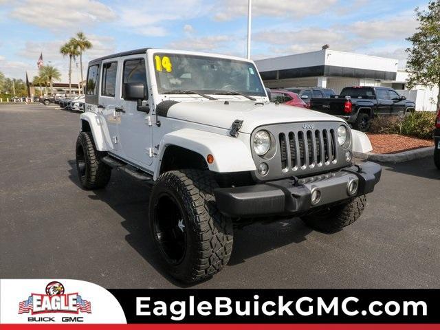 used 2014 Jeep Wrangler Unlimited car, priced at $23,620