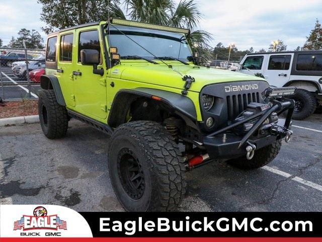 used 2016 Jeep Wrangler Unlimited car, priced at $23,420