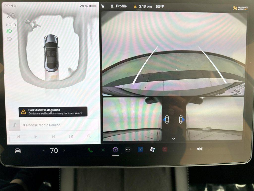 used 2023 Tesla Model 3 car, priced at $24,699