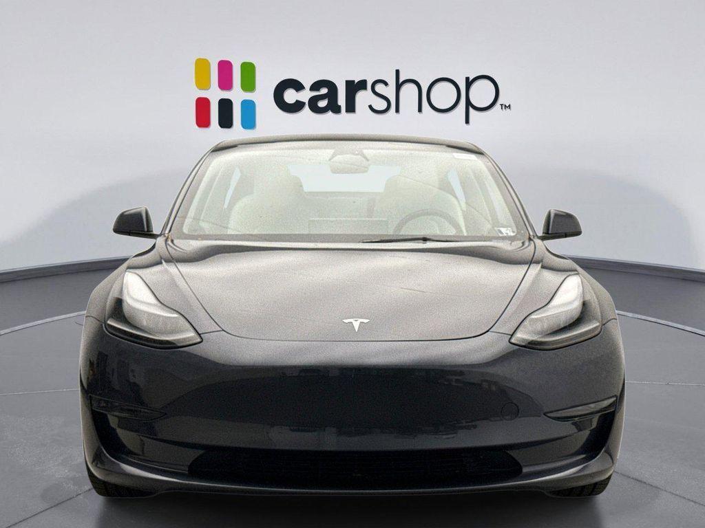 used 2023 Tesla Model 3 car, priced at $24,699