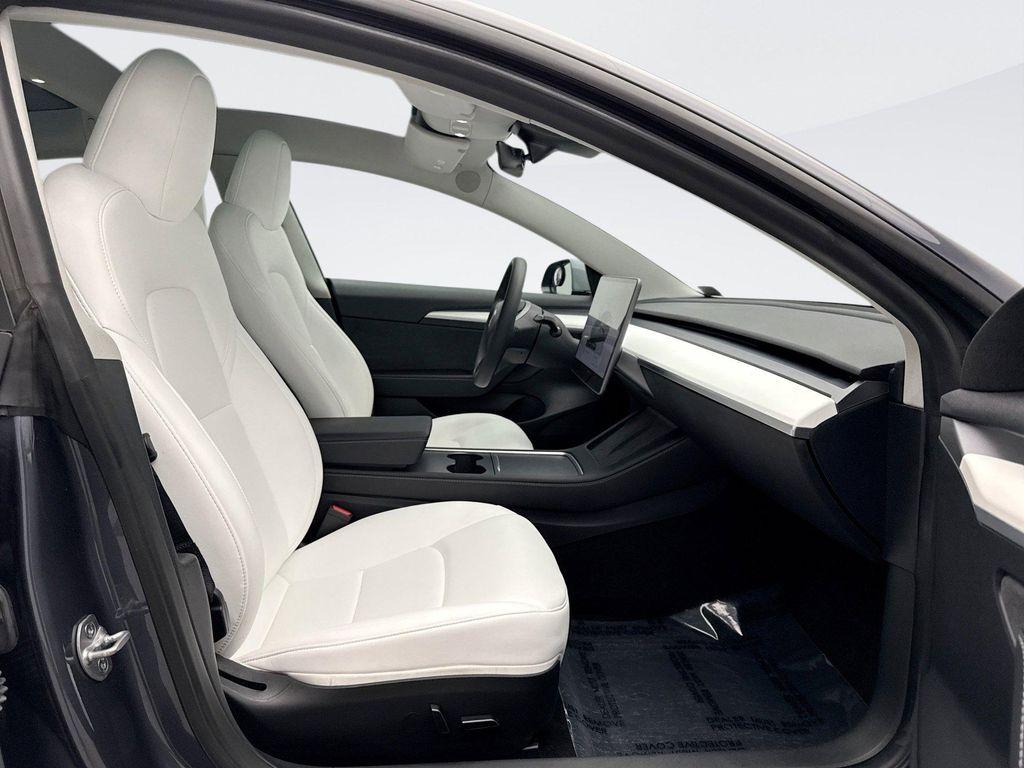 used 2023 Tesla Model 3 car, priced at $24,699