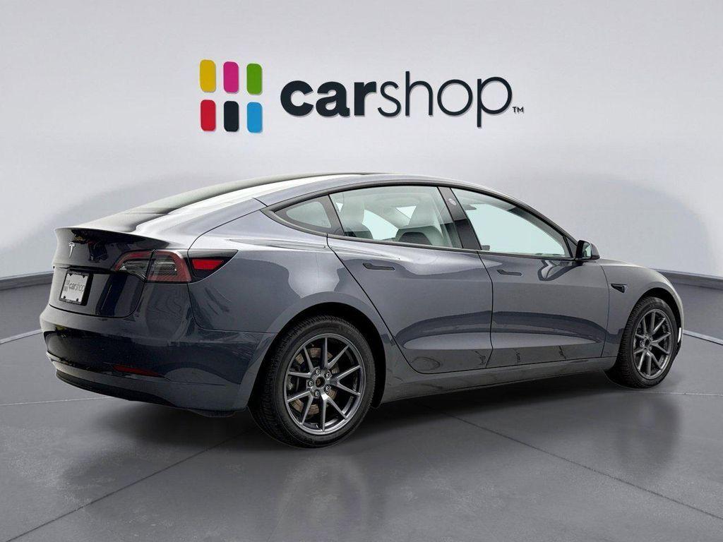 used 2023 Tesla Model 3 car, priced at $24,699