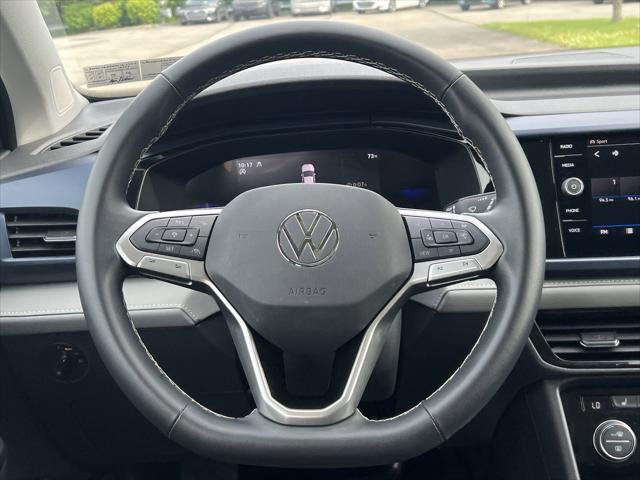 used 2024 Volkswagen Taos car, priced at $26,199