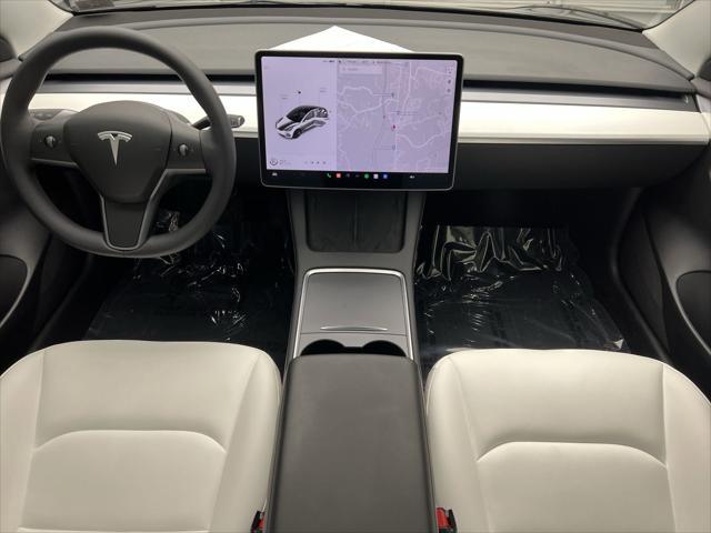 used 2023 Tesla Model 3 car, priced at $29,999