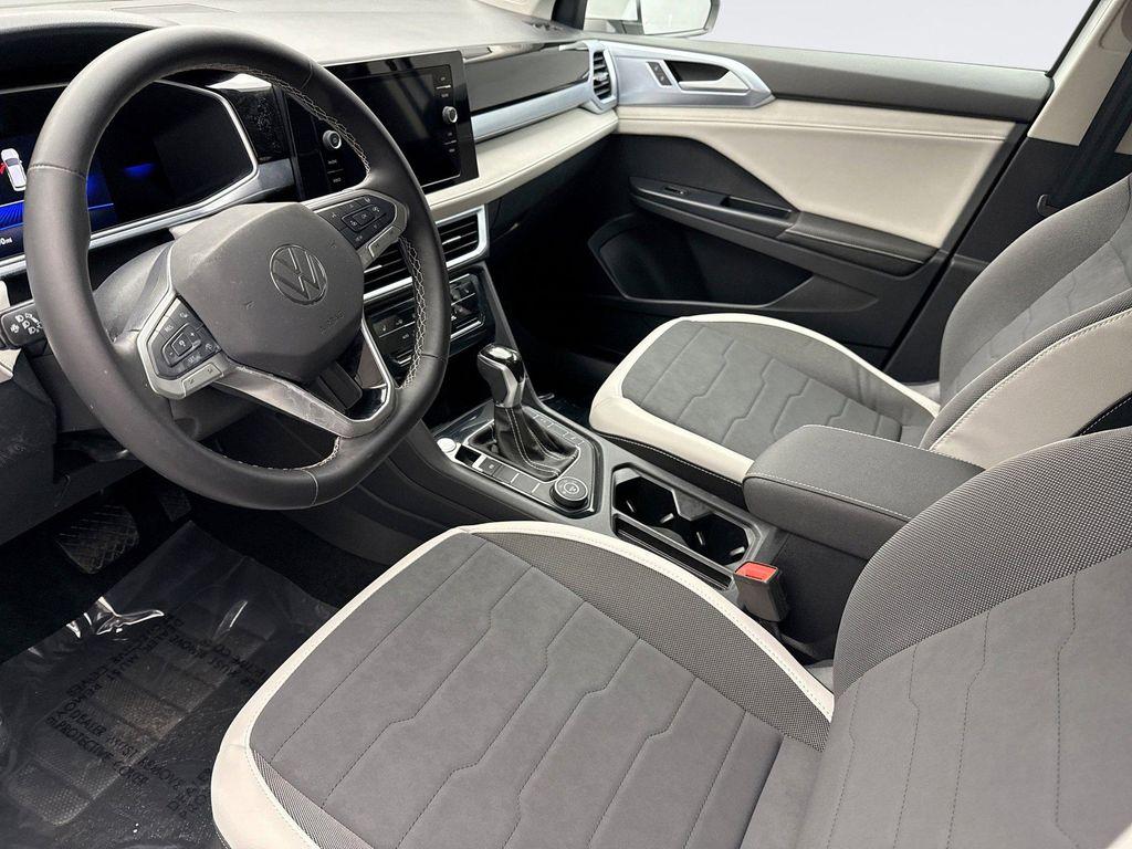 used 2025 Volkswagen Taos car, priced at $28,599