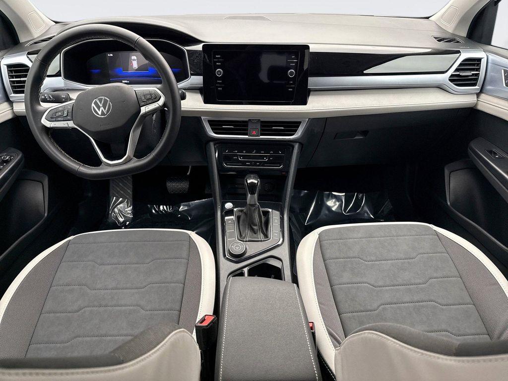 used 2025 Volkswagen Taos car, priced at $28,599