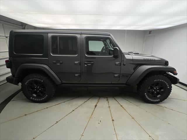 used 2023 Jeep Wrangler car, priced at $34,599