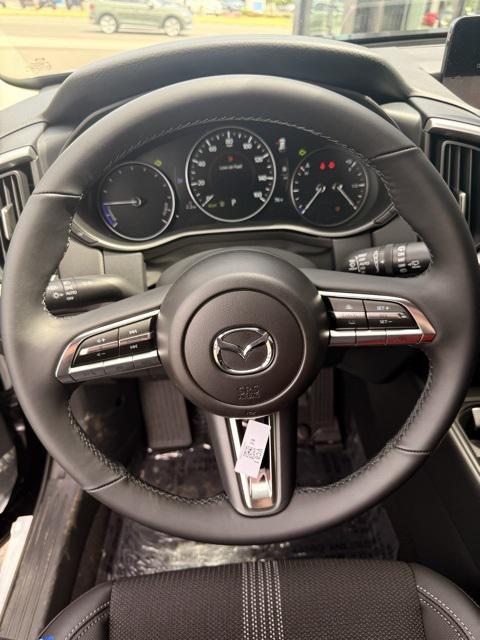 new 2025 Mazda CX-50 Hybrid car, priced at $34,852
