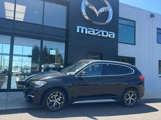 used 2018 BMW X1 car, priced at $20,990