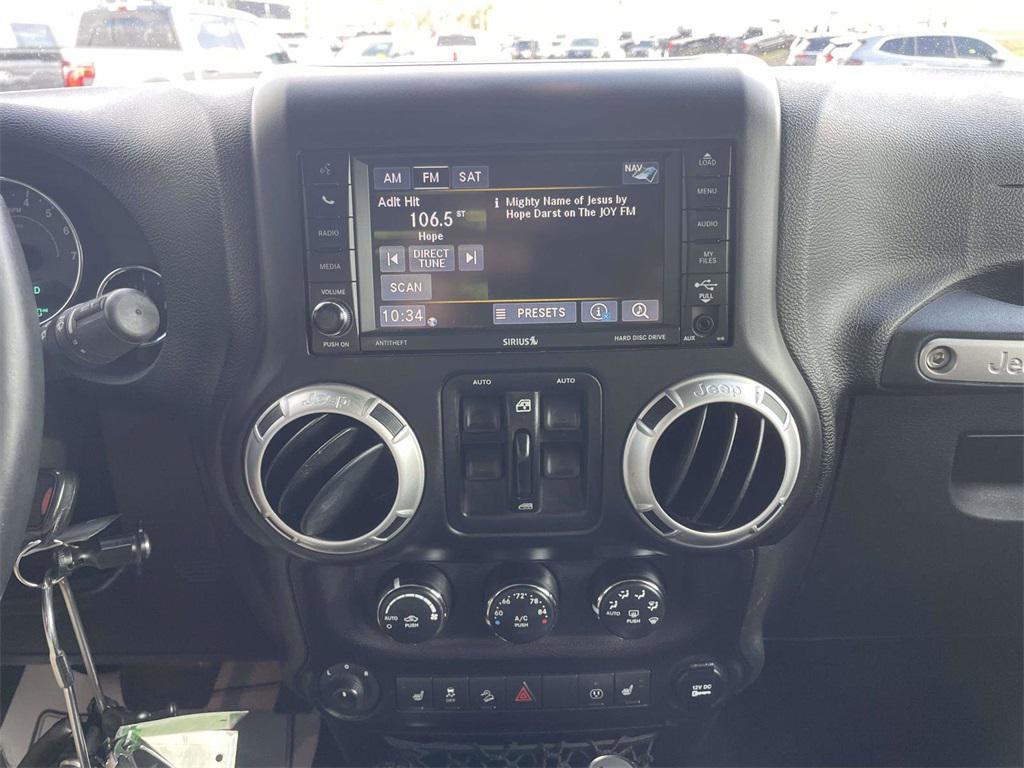 used 2015 Jeep Wrangler Unlimited car, priced at $15,735