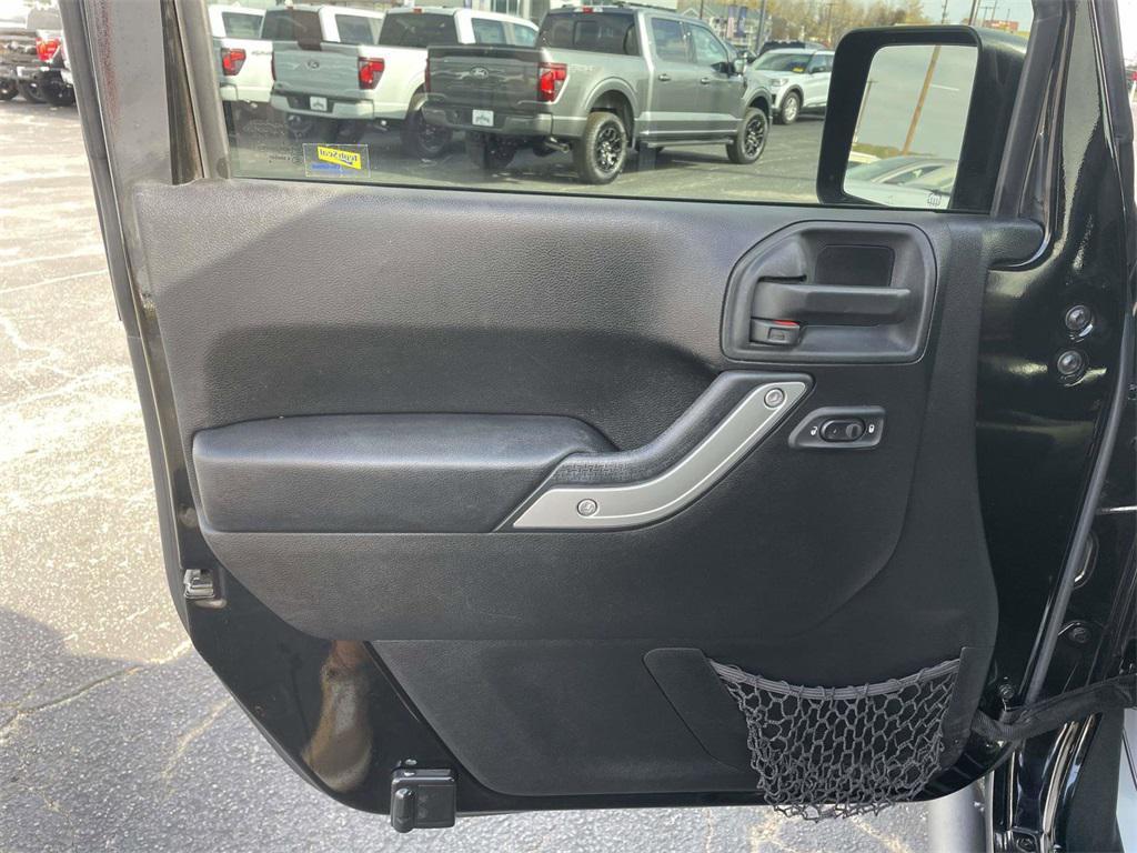 used 2015 Jeep Wrangler Unlimited car, priced at $15,735