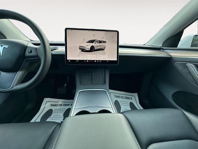 used 2023 Tesla Model Y car, priced at $29,999