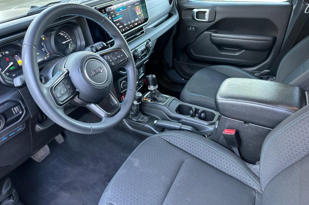 used 2024 Jeep Wrangler 4xe car, priced at $34,104