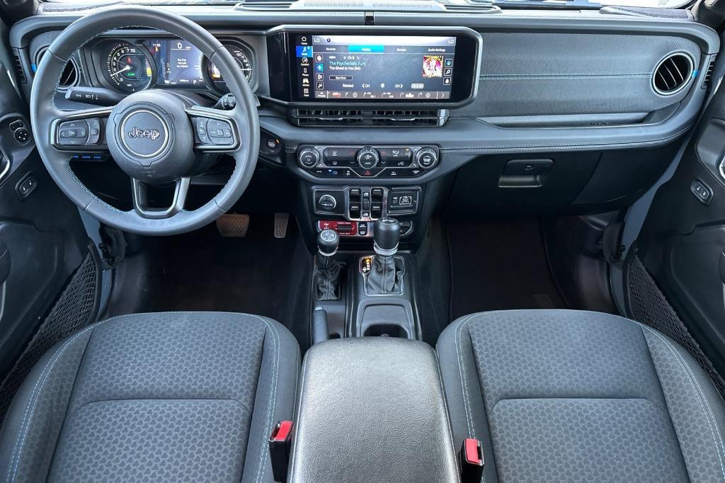 used 2024 Jeep Wrangler 4xe car, priced at $34,104