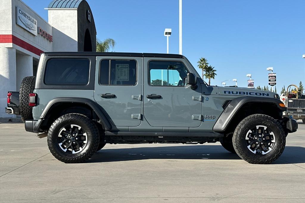 used 2024 Jeep Wrangler 4xe car, priced at $34,104