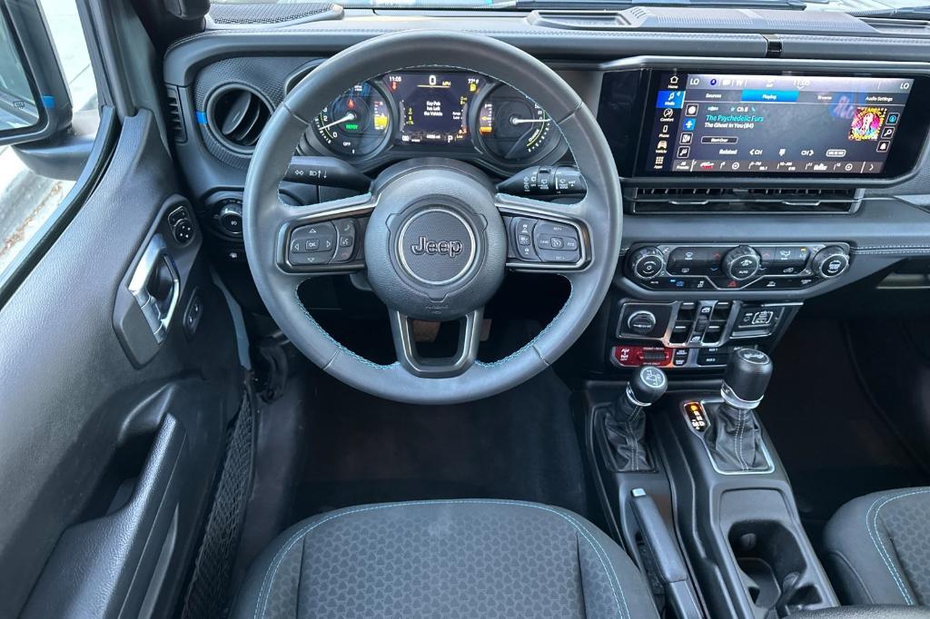 used 2024 Jeep Wrangler 4xe car, priced at $34,104