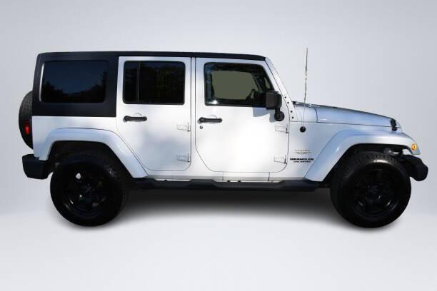 used 2013 Jeep Wrangler Unlimited car, priced at $15,364