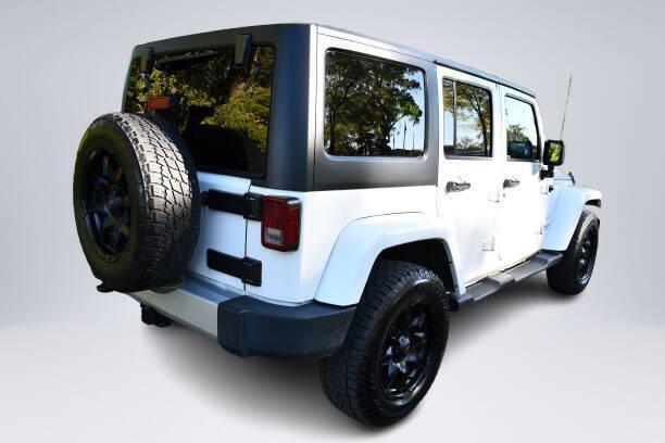 used 2013 Jeep Wrangler Unlimited car, priced at $15,364