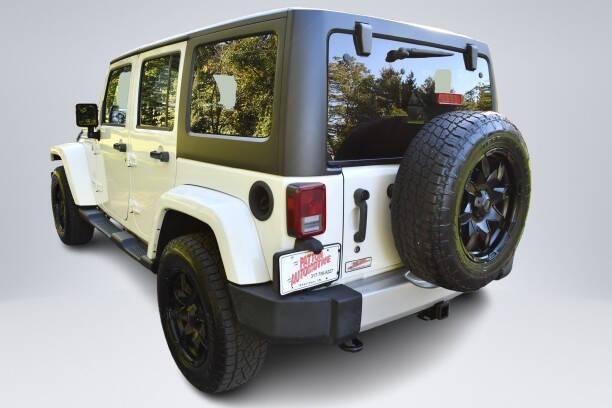 used 2013 Jeep Wrangler Unlimited car, priced at $15,364