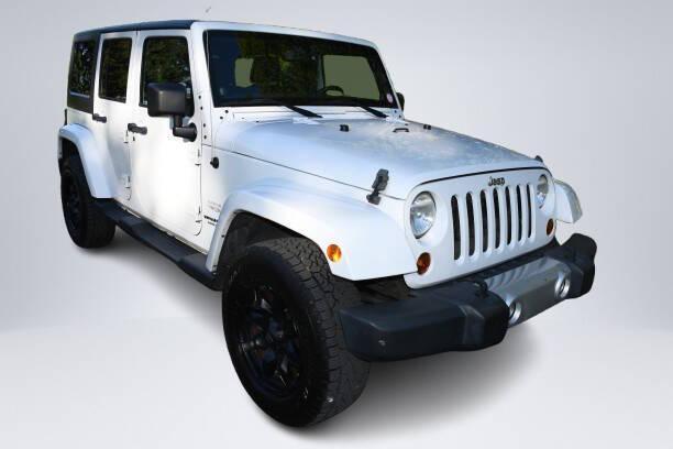 used 2013 Jeep Wrangler Unlimited car, priced at $15,364