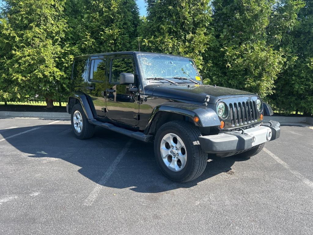 used 2013 Jeep Wrangler Unlimited car, priced at $12,325