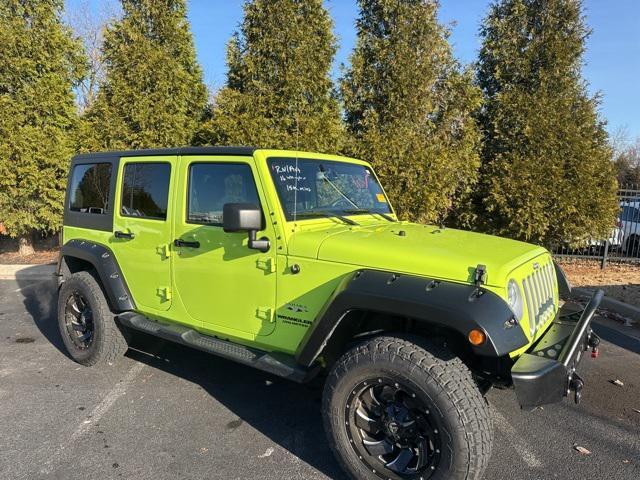 used 2016 Jeep Wrangler Unlimited car, priced at $25,166