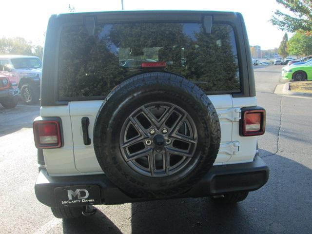 used 2024 Jeep Wrangler car, priced at $43,897