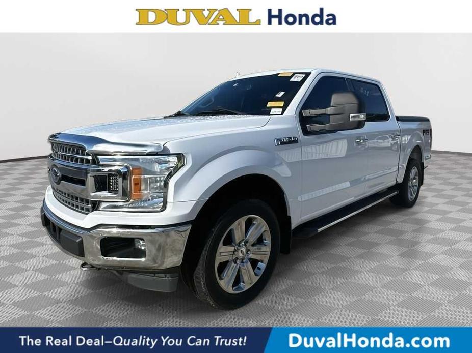 used 2018 Ford F-150 car, priced at $26,588