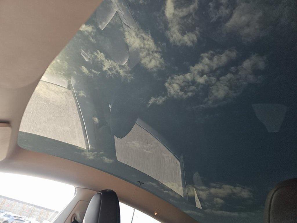 used 2024 Tesla Model Y car, priced at $33,490