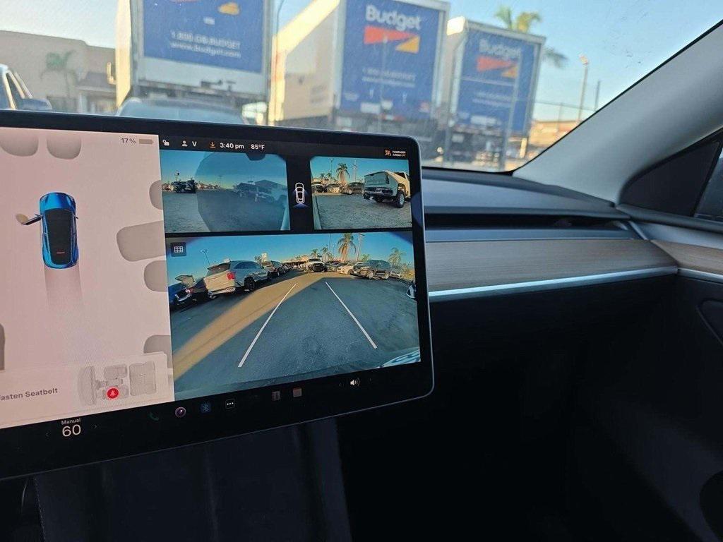 used 2025 Tesla Model Y car, priced at $35,490