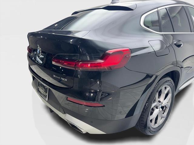 used 2023 BMW X4 car, priced at $37,980