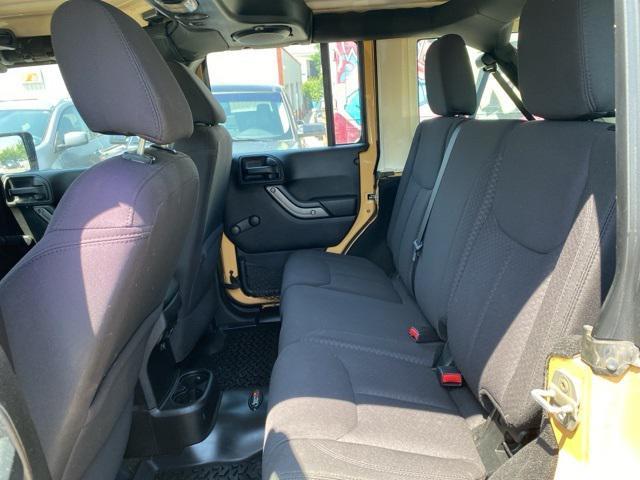 used 2014 Jeep Wrangler Unlimited car, priced at $13,499