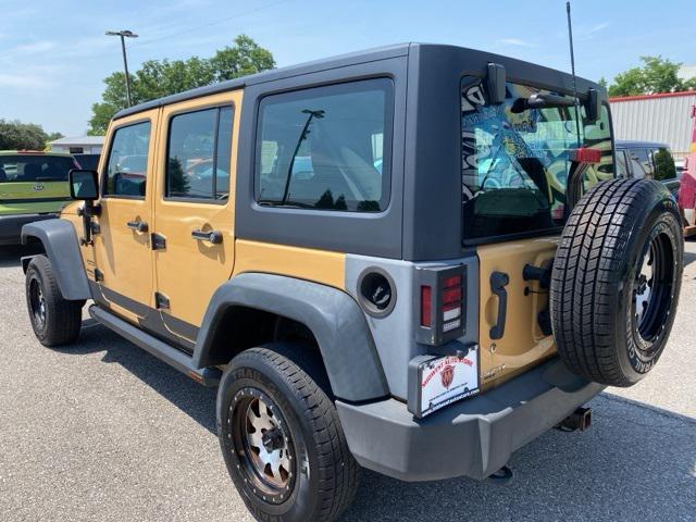 used 2014 Jeep Wrangler Unlimited car, priced at $13,499