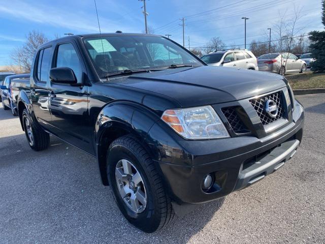 used 2010 Nissan Frontier car, priced at $15,299