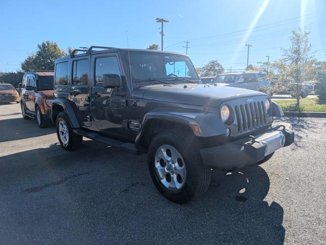 used 2014 Jeep Wrangler Unlimited car, priced at $12,999