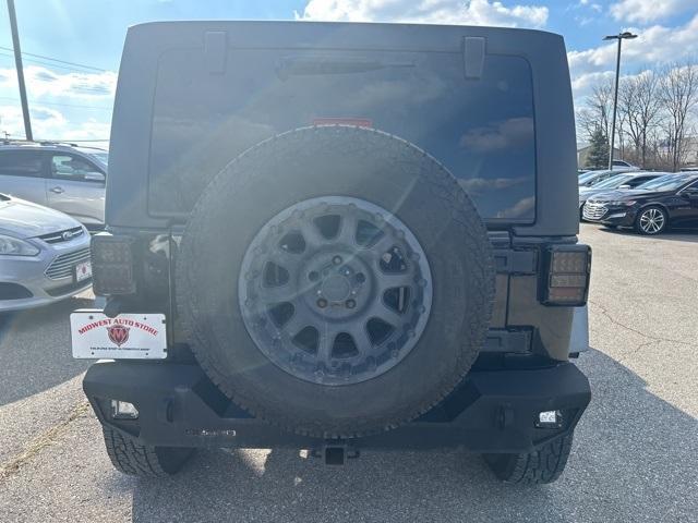 used 2012 Jeep Wrangler Unlimited car, priced at $18,299