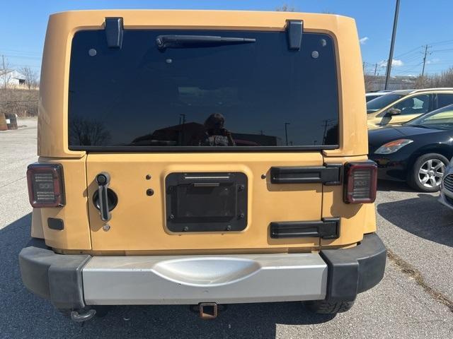 used 2013 Jeep Wrangler Unlimited car, priced at $16,799