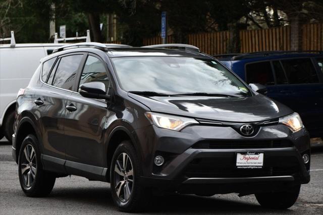 used 2018 Toyota RAV4 car, priced at $19,495