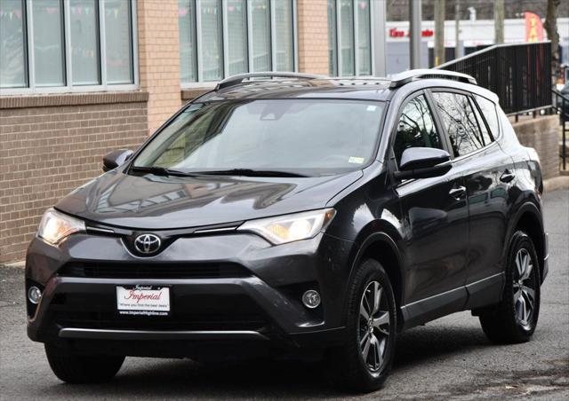 used 2018 Toyota RAV4 car, priced at $19,495