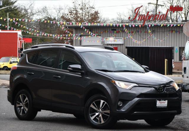 used 2018 Toyota RAV4 car, priced at $19,495