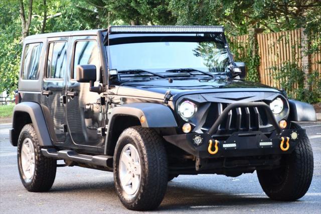 used 2015 Jeep Wrangler Unlimited car, priced at $13,995