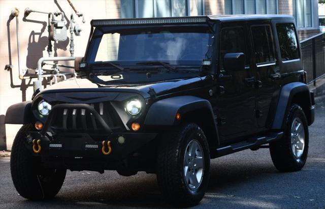 used 2015 Jeep Wrangler Unlimited car, priced at $13,995